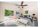 Cozy bedroom with vaulted ceilings, access to the pool area, and a comfortable bed at 1514 Lawrence Rd, Creedmoor, NC 27522