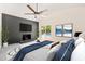 Bedroom featuring a dark brick fireplace and sliding glass doors to a pool area at 1514 Lawrence Rd, Creedmoor, NC 27522