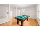 Spacious game room featuring a pool table and crown molding details at 1514 Lawrence Rd, Creedmoor, NC 27522