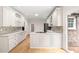 Well-lit kitchen with custom cabinets, countertops, and stainless steel appliances at 1514 Lawrence Rd, Creedmoor, NC 27522