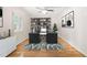 Well-lit home office with built-in shelving and a large work surface at 1514 Lawrence Rd, Creedmoor, NC 27522