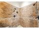 Tiled shower featuring diamond tile pattern and a shower niche at 1514 Lawrence Rd, Creedmoor, NC 27522