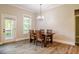 Dining room with natural light and access to outdoor patio at 152 Chauncey Cir, Chapel Hill, NC 27516