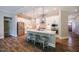 Spacious kitchen with a large island, stainless appliances, and modern pendant lighting at 152 Chauncey Cir, Chapel Hill, NC 27516