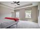 Spacious main bedroom features tray ceiling, carpet, and windows at 152 Chauncey Cir, Chapel Hill, NC 27516