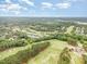 Panoramic aerial shot of the golf course community featuring lush greenery, well-maintained fairways, and beautiful homes at 1608 Heritage Links Dr, Wake Forest, NC 27587