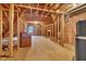 Unfinished attic with exposed wooden beams and framing, offering potential for customization at 1608 Heritage Links Dr, Wake Forest, NC 27587