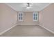 Neutral bedroom with carpet flooring, ceiling fan, and natural lighting at 1608 Heritage Links Dr, Wake Forest, NC 27587