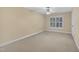 Bedroom with a ceiling fan and large window at 1608 Heritage Links Dr, Wake Forest, NC 27587