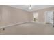 Bright bedroom with carpet flooring, ceiling fan, and en-suite bathroom at 1608 Heritage Links Dr, Wake Forest, NC 27587