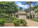 Charming home featuring a brick facade, well-manicured lawn, and an attached two-car garage at 1608 Heritage Links Dr, Wake Forest, NC 27587