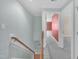 Hallway with staircase and open doorway, creating a welcoming and spacious feel at 1608 Heritage Links Dr, Wake Forest, NC 27587