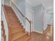 Stairway with wood steps and railing at 1608 Heritage Links Dr, Wake Forest, NC 27587