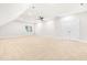 Spacious bonus room featuring a closet, ceiling fan, neutral carpet, recessed lighting, and a window at 166 Daffodil Ln, Clayton, NC 27527