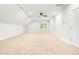 Spacious bonus room featuring a ceiling fan, neutral carpet, recessed lighting, and a window at 166 Daffodil Ln, Clayton, NC 27527