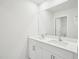 Bathroom featuring double sinks, mirror, and a toilet at 170 Baker Farm Dr, Youngsville, NC 27596