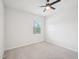 Cozy bedroom with neutral carpeting and a ceiling fan at 170 Baker Farm Dr, Youngsville, NC 27596