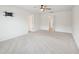 Spacious bedroom with carpet, a ceiling fan, and a TV mount on the wall at 170 Baker Farm Dr, Youngsville, NC 27596