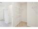 Walk-in closet with shelving for storing items at 170 Baker Farm Dr, Youngsville, NC 27596
