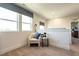 Comfortable bedroom nook featuring a chair, window, and cozy decor at 18 Relaxing Way, Pittsboro, NC 27312