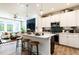 Beautiful kitchen featuring a spacious island, stainless steel appliances, and open floorplan at 18 Relaxing Way, Pittsboro, NC 27312