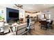 Spacious open-concept living area featuring modern decor and a seamless flow to the kitchen and dining room at 18 Relaxing Way, Pittsboro, NC 27312