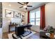 Bright home office featuring modern decor, a ceiling fan, and bright window at 18 Relaxing Way, Pittsboro, NC 27312