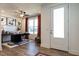 Inviting home office featuring bright light from large windows and stylish decor at 18 Relaxing Way, Pittsboro, NC 27312