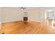 Inviting living room featuring a fireplace and hardwood flooring throughout at 1870 Lennox Dr, Garner, NC 27529