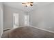Bedroom with neutral tones, ceiling fan, and carpeted flooring at 2010 Silky Dogwood Trl, Apex, NC 27502