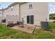 Back patio featuring sliding door access, and a privacy fence at 2018 Grassy Banks Dr, Raleigh, NC 27610