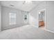 Main bedroom with natural light and an en suite bathroom with modern vanity at 2018 Grassy Banks Dr, Raleigh, NC 27610