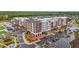 Aerial view of a mixed-use development with apartments, retail spaces, and landscaped walkways at 203 Witheridge Ct, Apex, NC 27502