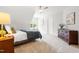 Bedroom with a window, and carpet creating a comfortable space at 203 Witheridge Ct, Apex, NC 27502