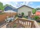 Charming backyard with patio seating, a grill, and landscaped garden at 2070 Great Ridge Pkwy, Chapel Hill, NC 27516