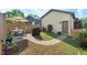 Lush backyard featuring a patio, garden, a grill, and a privacy fence at 2070 Great Ridge Pkwy, Chapel Hill, NC 27516