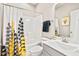 Bright bathroom showcasing a shower-tub combo and modern fixtures at 2070 Great Ridge Pkwy, Chapel Hill, NC 27516