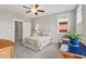 Neutral bedroom with carpet, a ceiling fan, and a closet at 2070 Great Ridge Pkwy, Chapel Hill, NC 27516