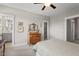 Bedroom featuring a bed, dresser, and an ensuite bathroom at 2070 Great Ridge Pkwy, Chapel Hill, NC 27516