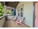 Inviting front porch with comfortable seating, perfect for relaxing and enjoying the neighborhood views at 2070 Great Ridge Pkwy, Chapel Hill, NC 27516