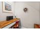Cozy office nook with a wooden desk, red chair, and artwork for a creative workspace at 2070 Great Ridge Pkwy, Chapel Hill, NC 27516