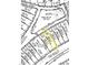 Plat map of the property with dimensions and easements outlined in yellow at 2070 Great Ridge Pkwy, Chapel Hill, NC 27516