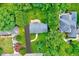 Aerial view of the home showcasing its landscaped surroundings and driveway at 2109 W Marilyn Cir, Cary, NC 27513
