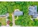 Aerial view of the home showing the backyard, surrounding greenery, and driveway at 2109 W Marilyn Cir, Cary, NC 27513