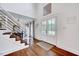 Welcoming foyer with hardwood floors and staircase at 2109 W Marilyn Cir, Cary, NC 27513