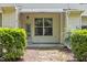 Back porch showing door, window, patio and landscaped yard at 220 Mount Evans Dr, Durham, NC 27705