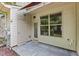 Back porch showing door, window, patio, lighting and outlets at 220 Mount Evans Dr, Durham, NC 27705