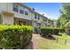 Well-maintained backyard with lush greenery and partial view of the home's exterior at 220 Mount Evans Dr, Durham, NC 27705