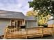 Wooden back deck outside the house with flower boxes and view of backyard at 2200 Wyman Pl, Durham, NC 27707
