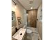 Updated bathroom features a modern vanity, sleek fixtures, and a glass enclosed shower at 2200 Wyman Pl, Durham, NC 27707